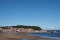 scarborough south bay beach with the town lighthouse harbour and on a sunlit summer day Royalty Free Stock Photo
