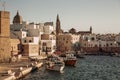 View of scenic city scape and a fishing harbor with marina in Monopoli, Royalty Free Stock Photo
