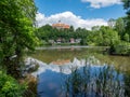 View of Schoenfels Castle with the castle pond