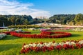 View on Schonbrunn Palace and garden with colorful flowers, Austrian flag made of flowers Royalty Free Stock Photo