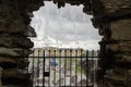 View of the Schonbrunn Palace in Vienna through a fountain cave