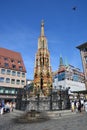 View of the `Schoner Brunnen` fountain in the historical town of Nuremberg, Germany