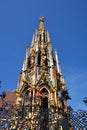 View of the `Schoner Brunnen` fountain in the historical town of Nuremberg, Germany