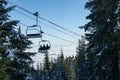 View of Screaming eagle chairlift with people at the Grouse mountain Ski Resort