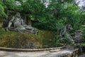 View of sculpture amidst the vegetation in the Park of Bomarzo.