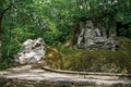 View of sculpture amidst the vegetation in the Park of Bomarzo.