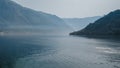 View on the sea bay covered with morning fog. Kotor bay, Montenegro Royalty Free Stock Photo