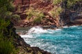 View of sea beach with waves and rocky coast. Red Sand Beach, Maui in in Hawaiian. Royalty Free Stock Photo