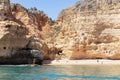 View from the sea of Carvoeiro beach. The Lagoa region has a coastline formed of towering cliffs, turquoise waters and picturesque