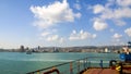 View of the sea and city beach from the port quay. Industrial po Royalty Free Stock Photo