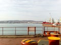 View of the sea and city beach from the port quay. Industrial po Royalty Free Stock Photo