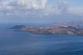 View of the sea and coast on the island of Santorini caldera in Greece. The background is a blue sky Royalty Free Stock Photo