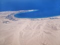 View on the sea and the desert from an airplane Royalty Free Stock Photo