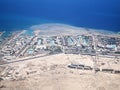 View on the sea and the desert from an airplane Royalty Free Stock Photo
