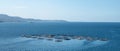 Sea fish farm cages and fishing nets, farming dorado, sea bream and sea bass, Ionian sea, Greece