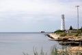 View of the sea, the lighthouse and the sunken ship Royalty Free Stock Photo