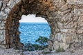 view of the sea through the loophole of the fortress