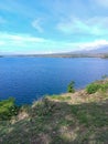 view of the sea and mountains of the coast of kolo bima Indonesia