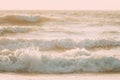 View sea ocean water surface with foaming small waves at sunset. Amazing landscape scenery. Ocean water foam splashes Royalty Free Stock Photo