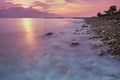 Sunset or sunrise landscape, panorama of beautiful nature, beach with colorful red, orange and purple clouds reflected in the ocea Royalty Free Stock Photo