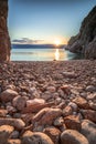 view of the sea in the sunrise, hidden stone beach at Vibnik Krk in Croatia