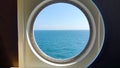 View of the sea surface through a porthole of the ship Royalty Free Stock Photo