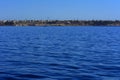 View from the sea to the bay, beautiful coral reefs form mountains and rocks against the blue sky and the clear sea coast of the u Royalty Free Stock Photo