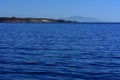 View from the sea to the bay, beautiful coral reefs form mountains and rocks against the blue sky and the clear sea coast of the u Royalty Free Stock Photo