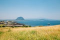 View of sea village and Sanbangsan Mountain in Jeju Island, Korea