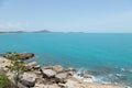 View of sea waves shore and fantastic rocky beach coast on the island and background sky with mountain, Wild nature. Tropical land