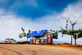 View of seacoast. Cafe on the street, outdoor restaurant, summer vacation. Royalty Free Stock Photo