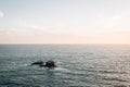 View of Seal Rock and the Pacific Ocean at sunset, from Crescent Bay Point Park, in Laguna Beach, Orange County, California