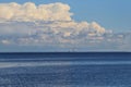 View of the seascape of cloudy sky and water from the shore of the Gulf of Finland