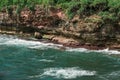 View of the seascape on the edge of the cliffs of Ngitun Beach, Gunungkidul, Yogyakarta