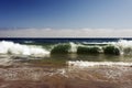 A view of a seascape, Pacific ocean, waves and foams and splash in Malibu, California Royalty Free Stock Photo