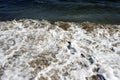 A view of a seascape, Pacific ocean, waves and foams and splash in Malibu, California Royalty Free Stock Photo