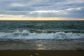 View of the seashore with a beautiful decline and a coastal surf Royalty Free Stock Photo