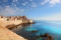 View of the seawall and harbor of Antibes France