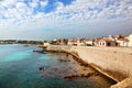 View of the seawall and harbor of Antibes France