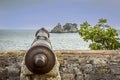 View seaward following the line of a cannon on the ramparts of the old Venetian fortress in Petrovac, Montenegro