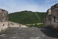 View of a section of the Great Wall of China and the surrounding mountains in Mutianyu Royalty Free Stock Photo