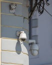 View of security cameras on a white wall of a building Royalty Free Stock Photo