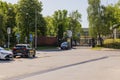 View of security cars in front of entrance to Russian Embassy metal fence. Stockholm, Royalty Free Stock Photo