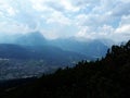 View of Seefeld village and mountains around from Bergbahnen Rosshutte on a cloudy day, Austria