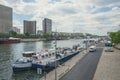 View of the Seine river with buildings of National Library of France in distance in Paris Royalty Free Stock Photo