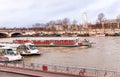 View of Seine river, ships, bridge, coast with ferris wheel in Paris. Royalty Free Stock Photo