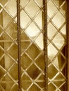View in sepia of an old lattice window in East Sussex, UK