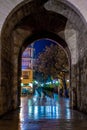 View through Serrano Towers (Torres de Serranos) at night. Towers are located on Plaza de los Fueros in Valencia Royalty Free Stock Photo