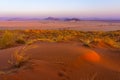 View of Sesriem at sunset from the top of the Elim dune in Namibia. Royalty Free Stock Photo