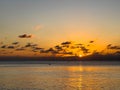 A view of Seven Mile Beach in Grand Cayman Island with a beautiful sunset Royalty Free Stock Photo